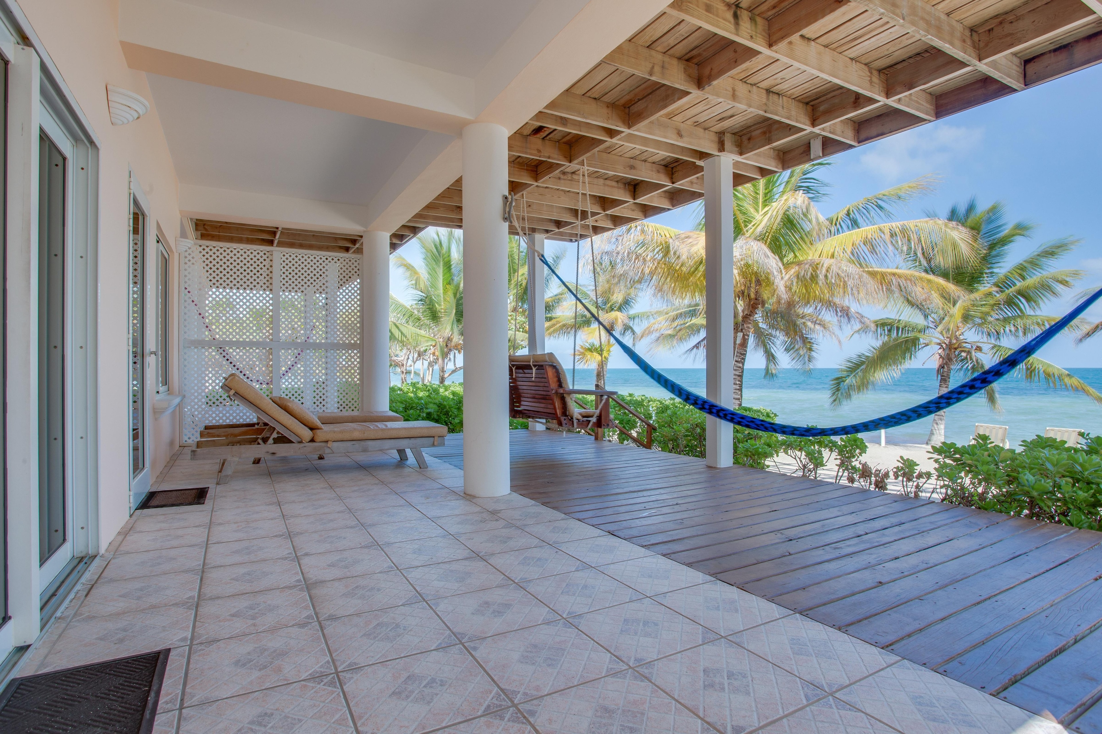 Would you look at that view? The beach is steps from our Oceanfront suites