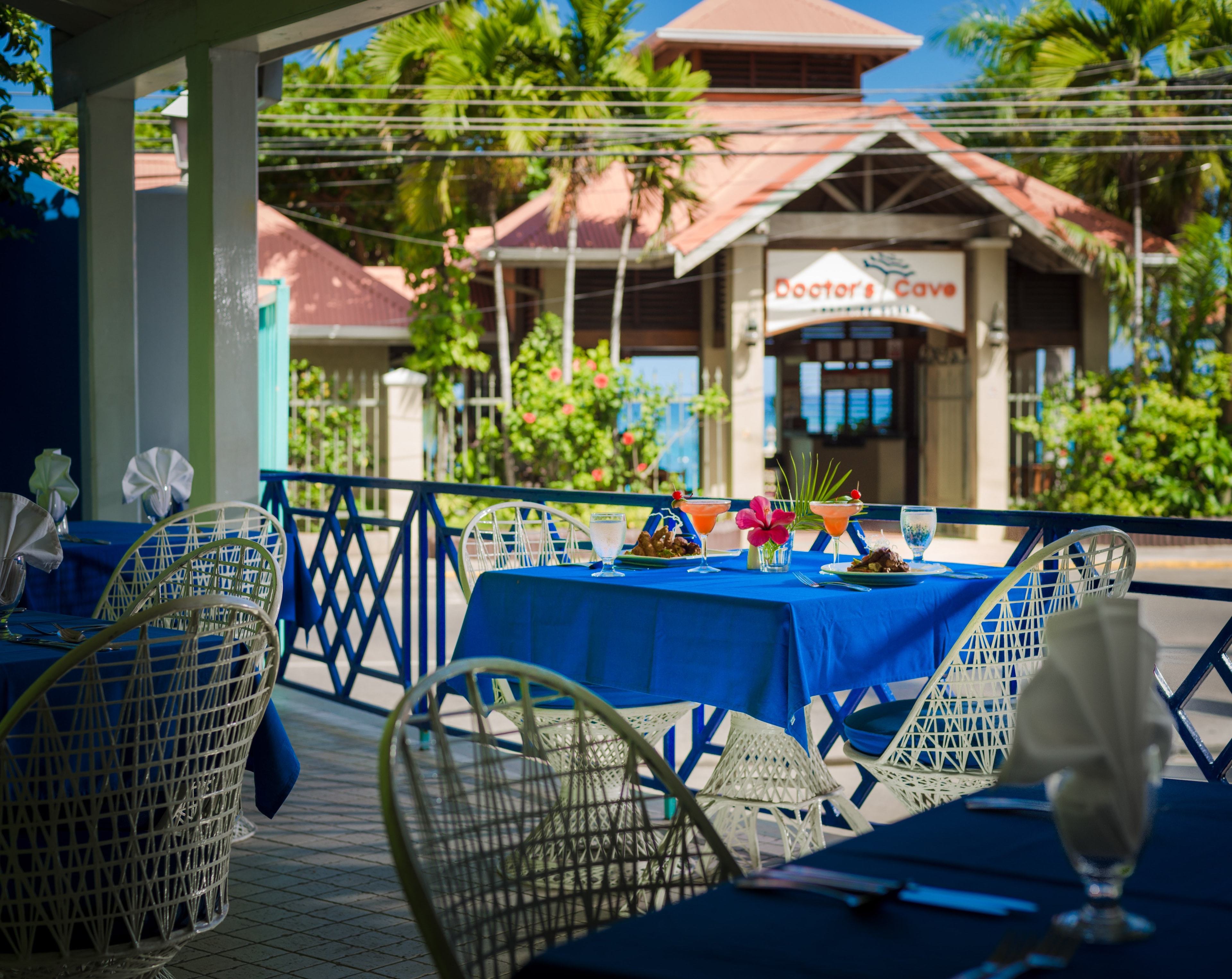Enjoy a delicious meal at our cafe style restaurant while taking in the activity of Montego Bay